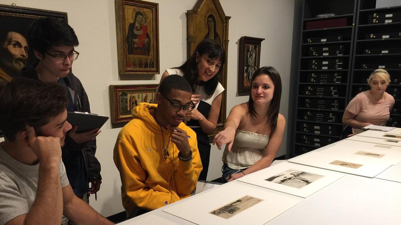 Pomona students looking at art